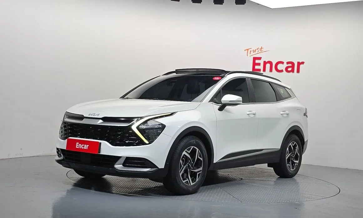 Kia Sportage — фото 1