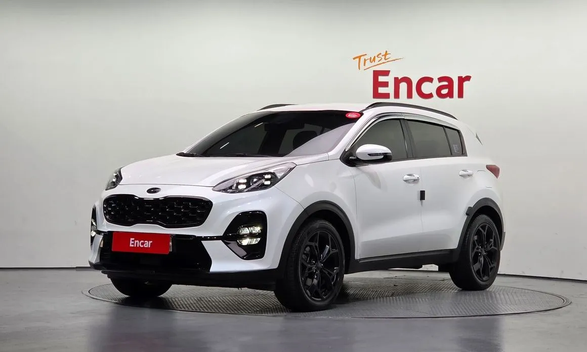 Kia Sportage — фото 1