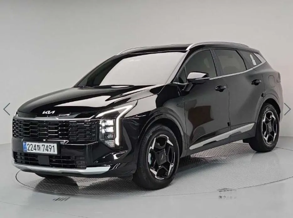 Kia Sportage — фото 1