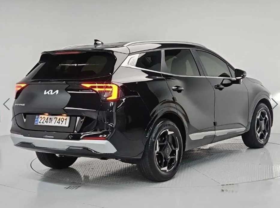 Kia Sportage — фото 5