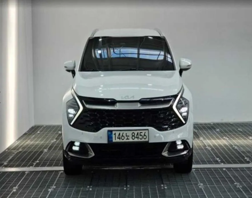 Kia Sportage — фото 1