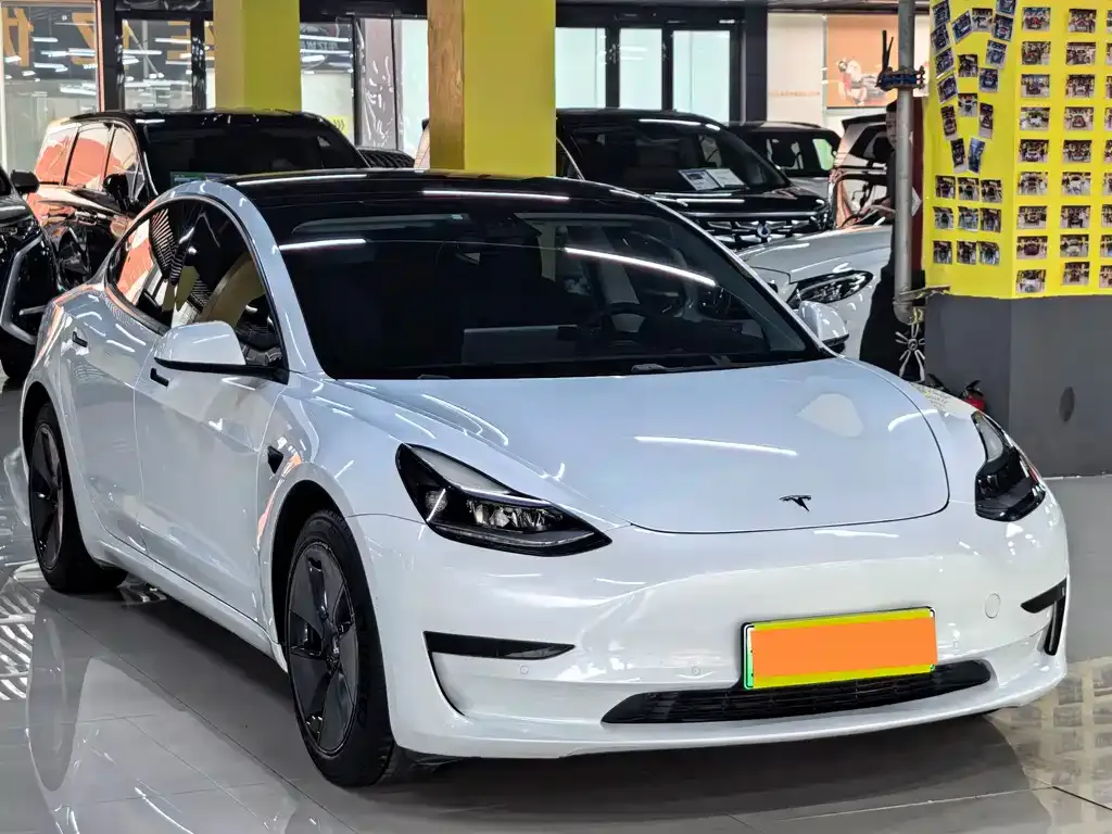Tesla Model 3 — фото 7