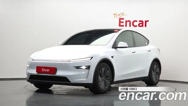 Tesla Model Y — фото 1