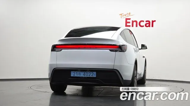 Tesla Model Y — фото 6