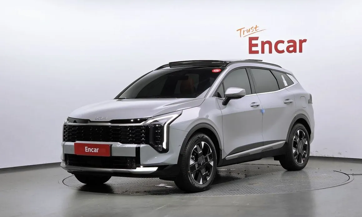 Kia Sportage — фото 1
