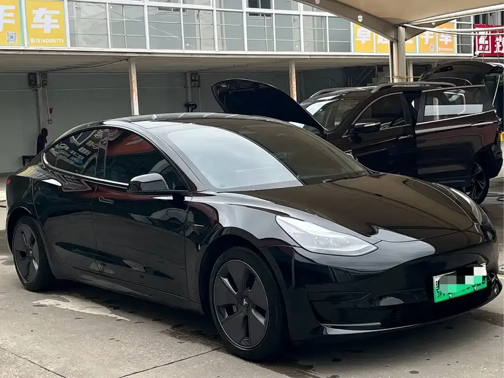 Tesla Model 3 — фото 7