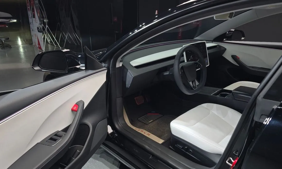 Tesla Model 3 — фото 10