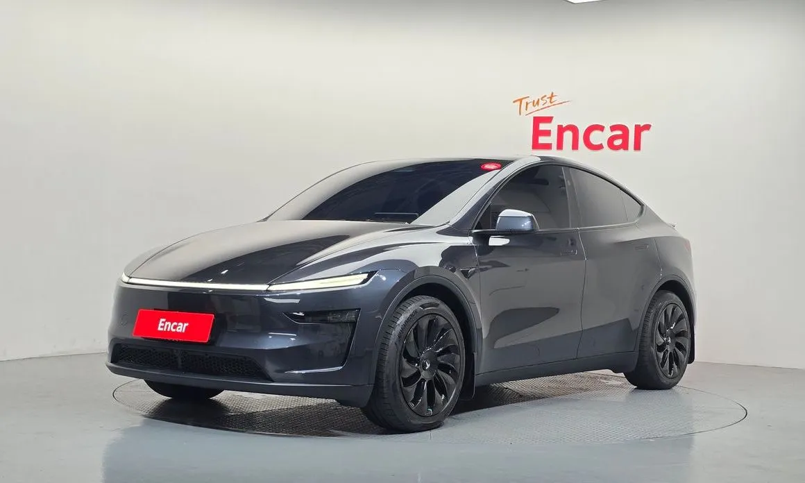 Tesla Model Y — фото 1