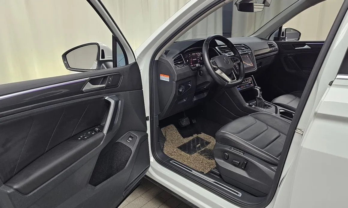 Volkswagen Tiguan — фото 7