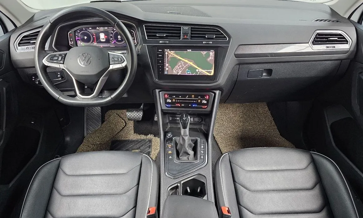 Volkswagen Tiguan — фото 10