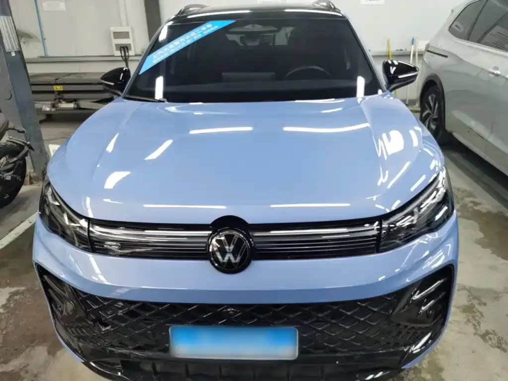 Volkswagen Tiguan L — фото 7