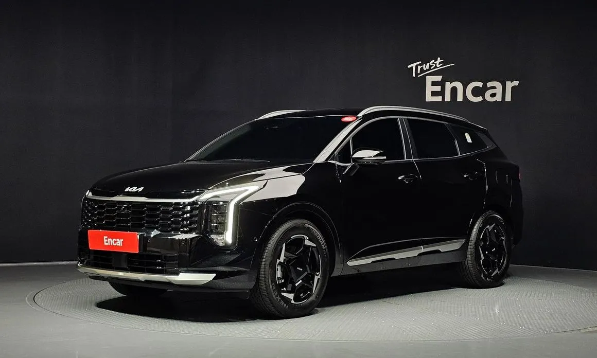 Kia Sportage — фото 1