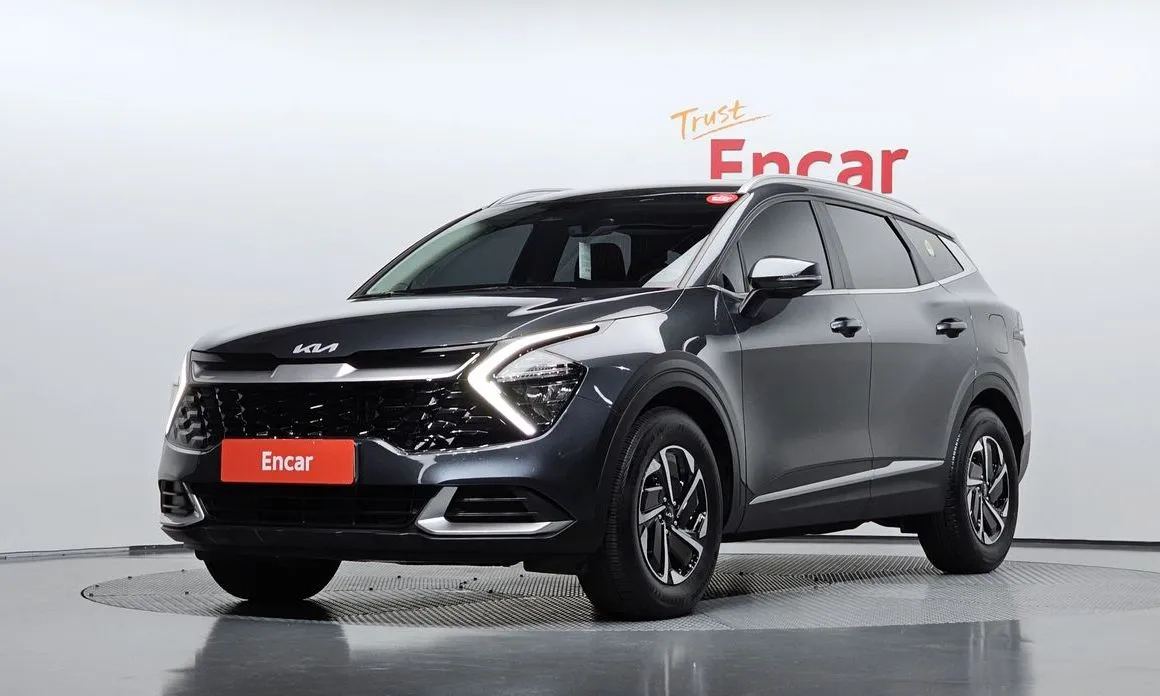 Kia Sportage — фото 1