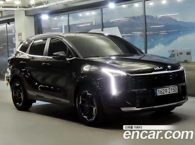 Kia Sportage — фото 1