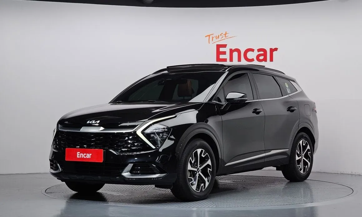 Kia Sportage — фото 1