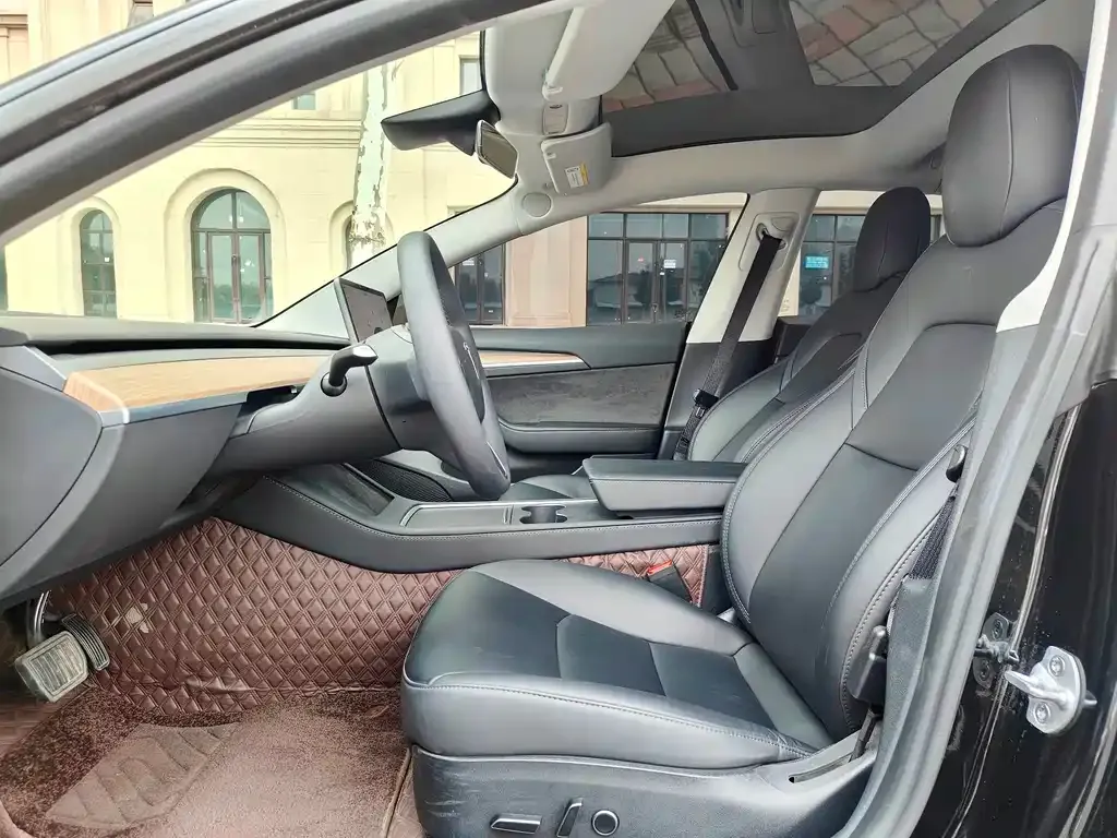 Tesla Model 3 — фото 10