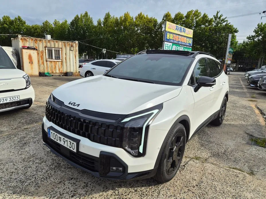 Kia Sportage — фото 1
