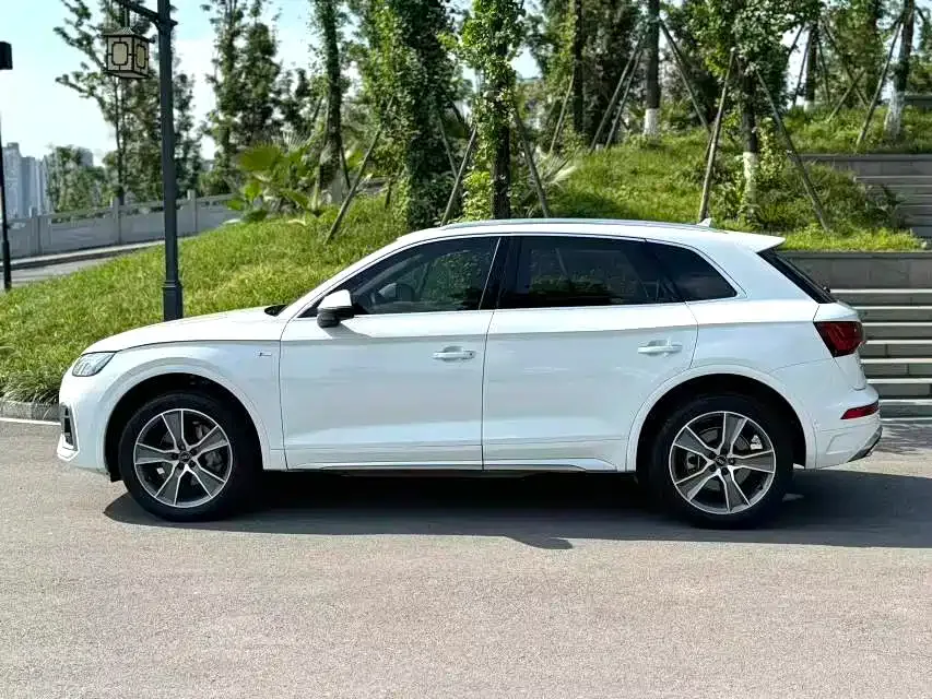 Audi Q5L — фото 6