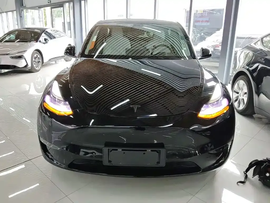 Tesla Model Y — фото 6