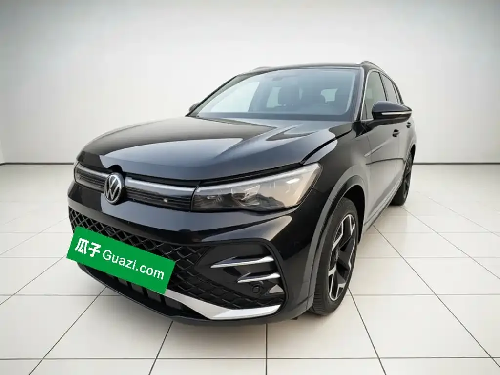 Volkswagen Tiguan L — фото 1