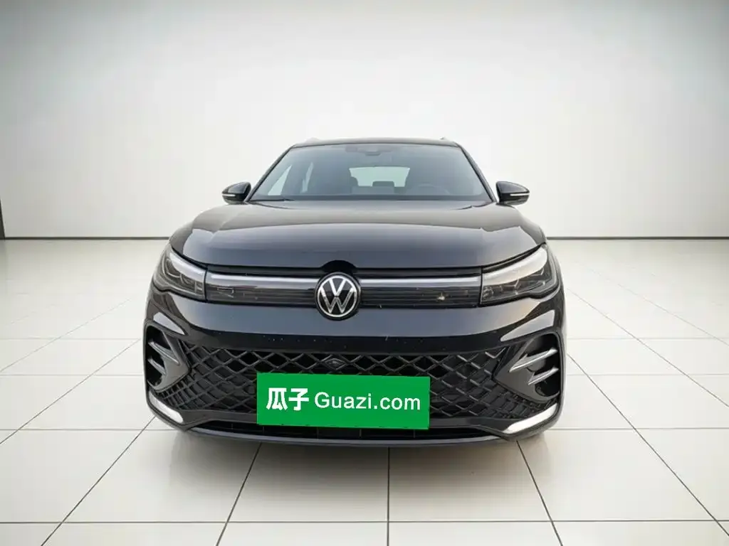 Volkswagen Tiguan L — фото 2