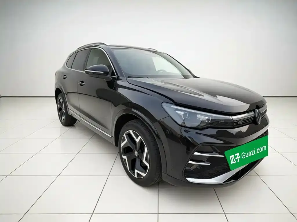Volkswagen Tiguan L — фото 7