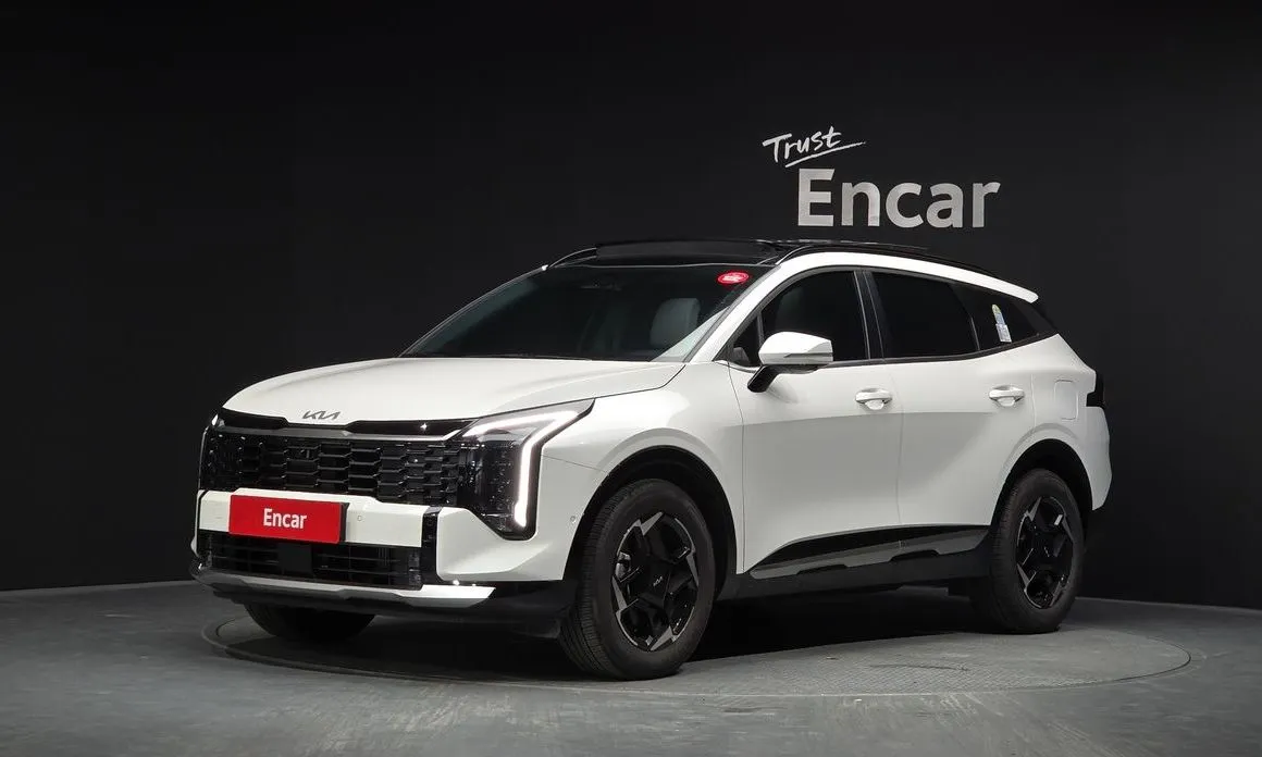 Kia Sportage — фото 1