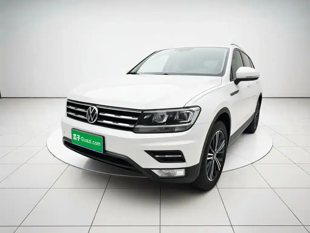Volkswagen Tiguan L — фото 1