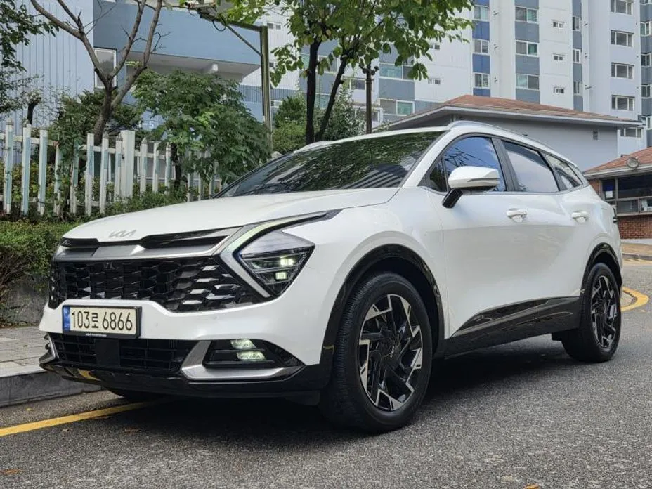 Kia Sportage — фото 1