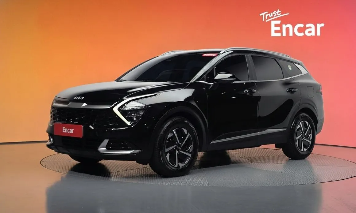 Kia Sportage — фото 1