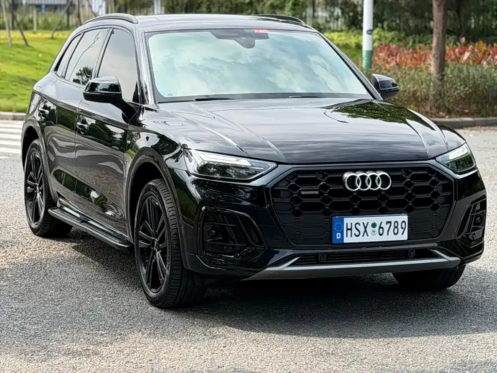 Audi Q5L — фото 10