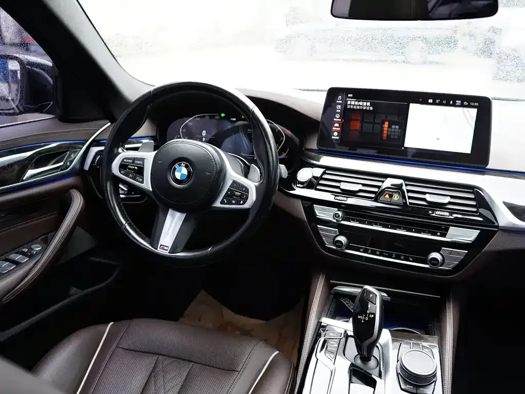 BMW 5 Series — фото 5