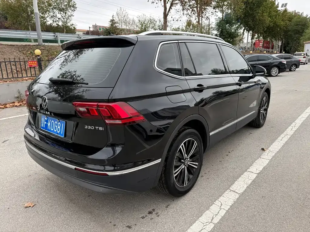 Volkswagen Tiguan L — фото 5