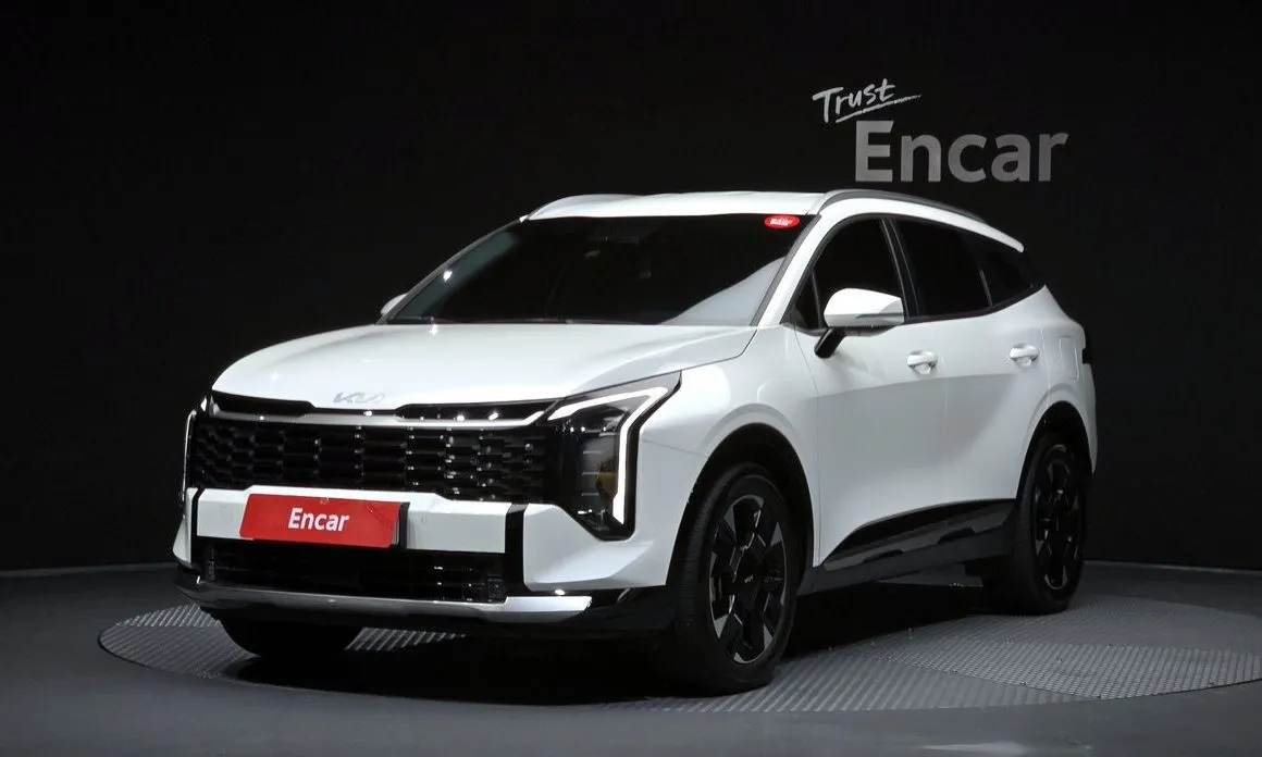 Kia Sportage — фото 1