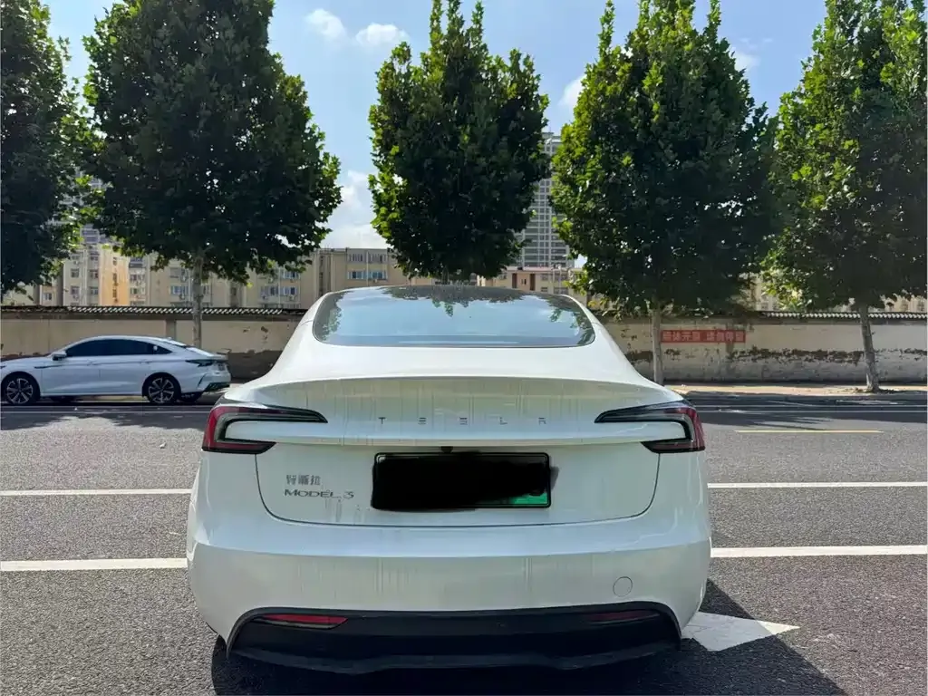 Tesla Model 3 — фото 9