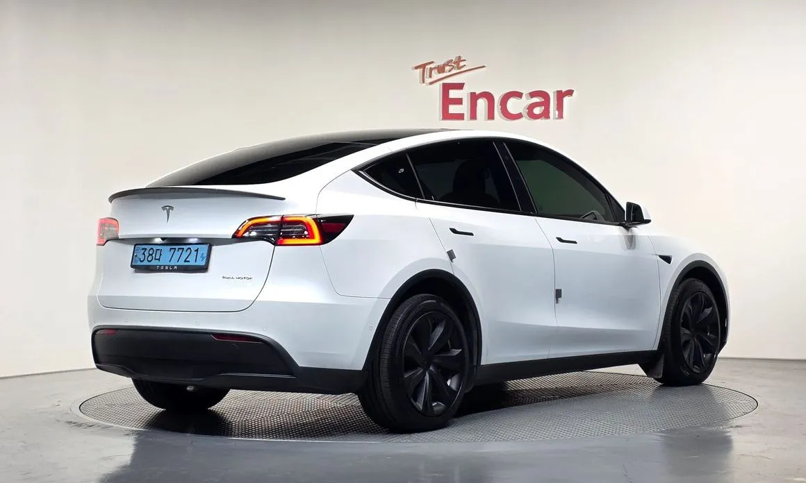 Tesla Model Y — фото 7