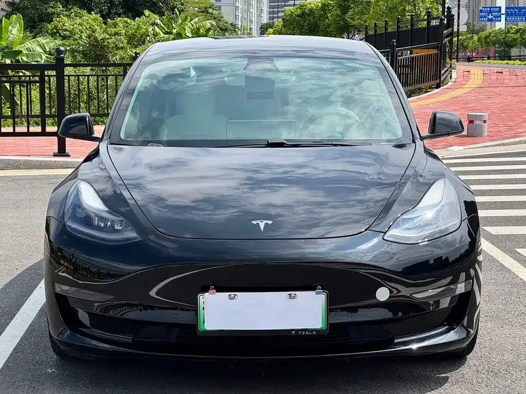 Tesla Model 3 — фото 7