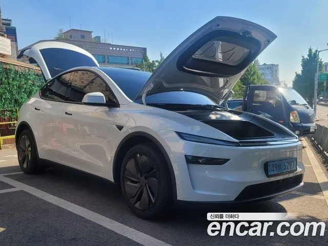 Tesla Model Y — фото 1