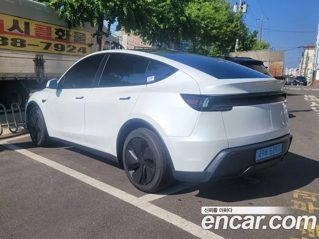 Tesla Model Y — фото 5