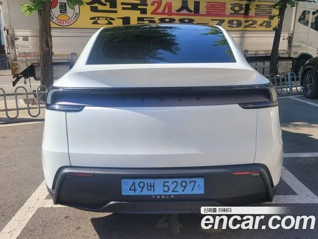 Tesla Model Y — фото 8