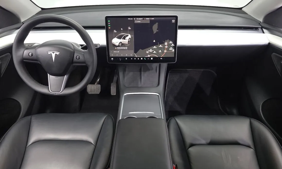 Tesla Model Y — фото 8