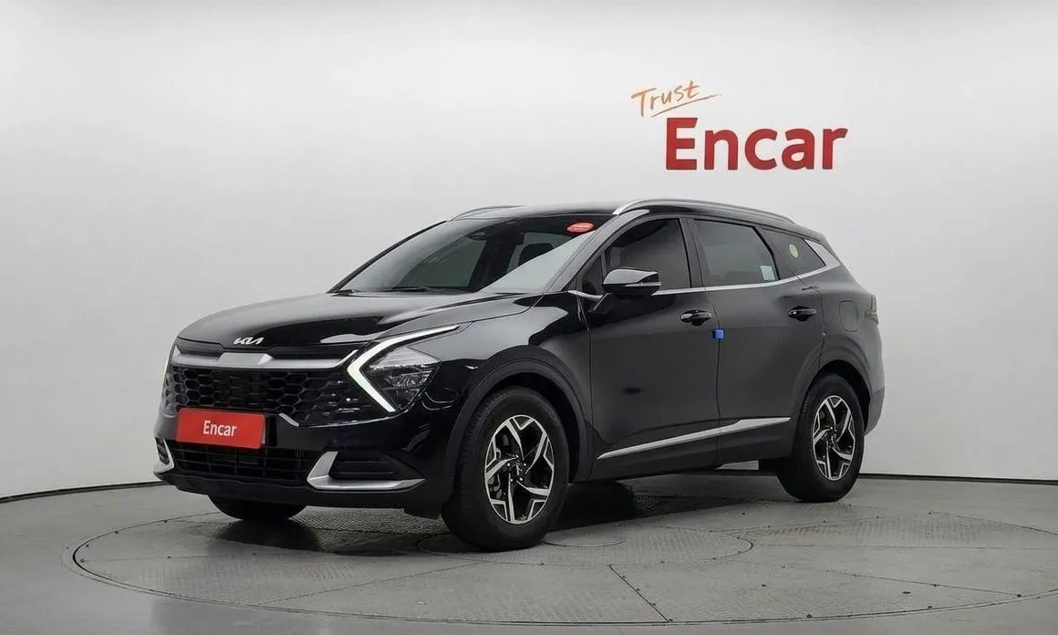 Kia Sportage — фото 1