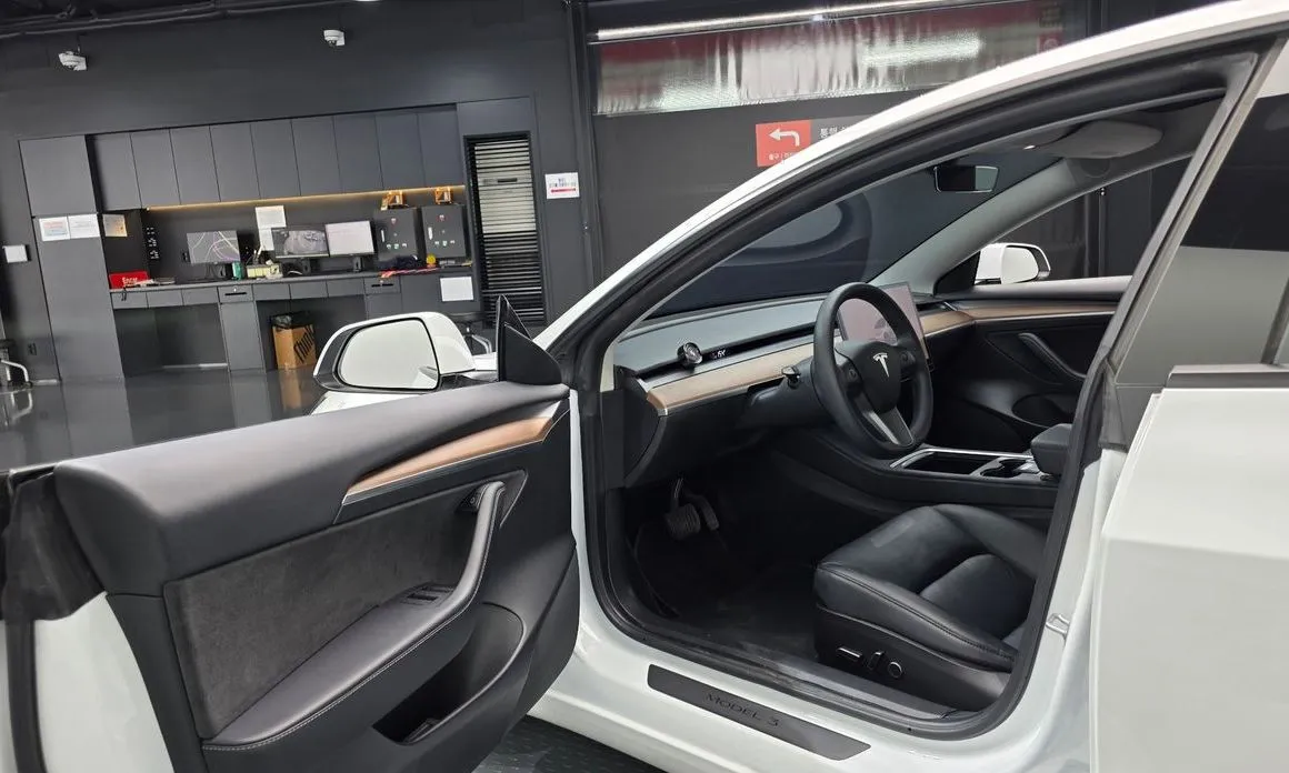 Tesla Model 3 — фото 10