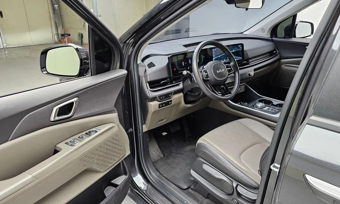 Kia Carnival — фото 10