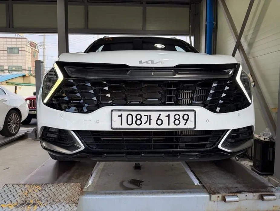 Kia Sportage — фото 1