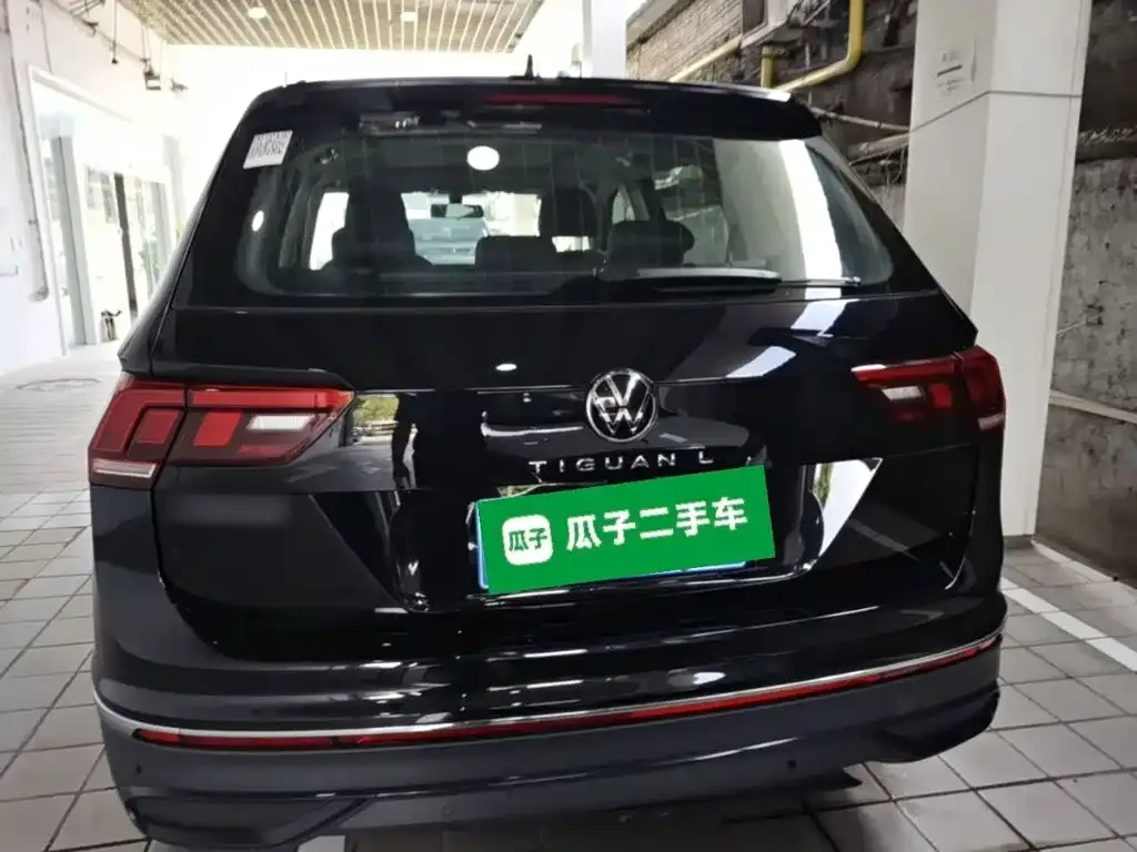 Volkswagen Tiguan L — фото 8