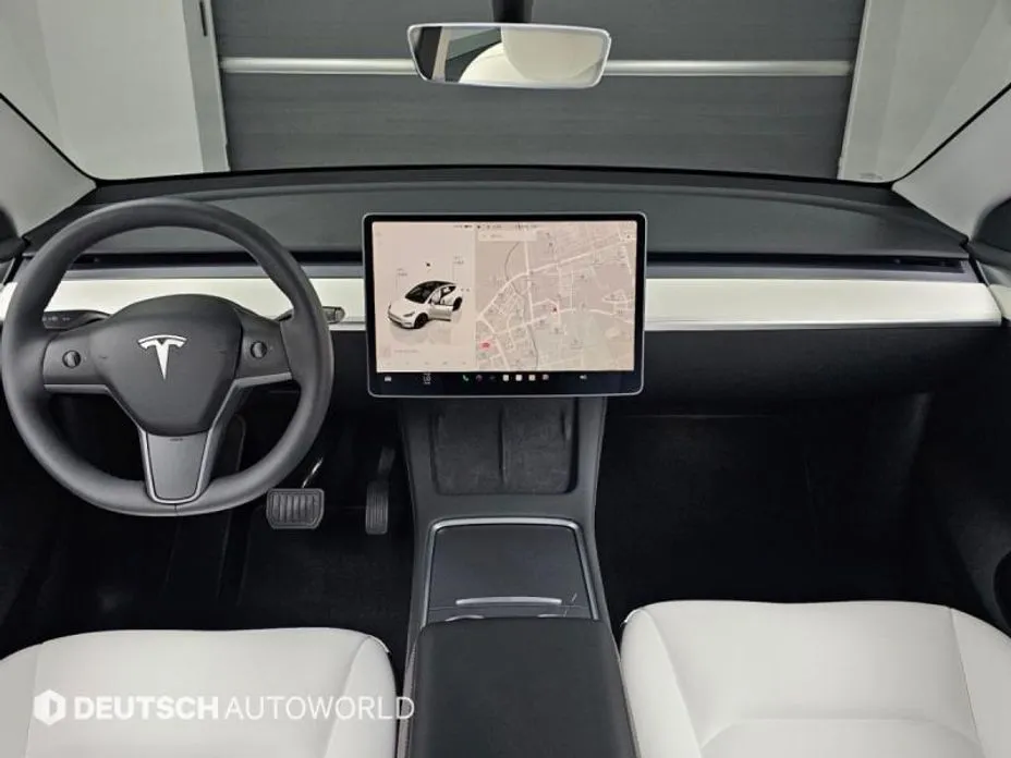 Tesla Model Y — фото 8
