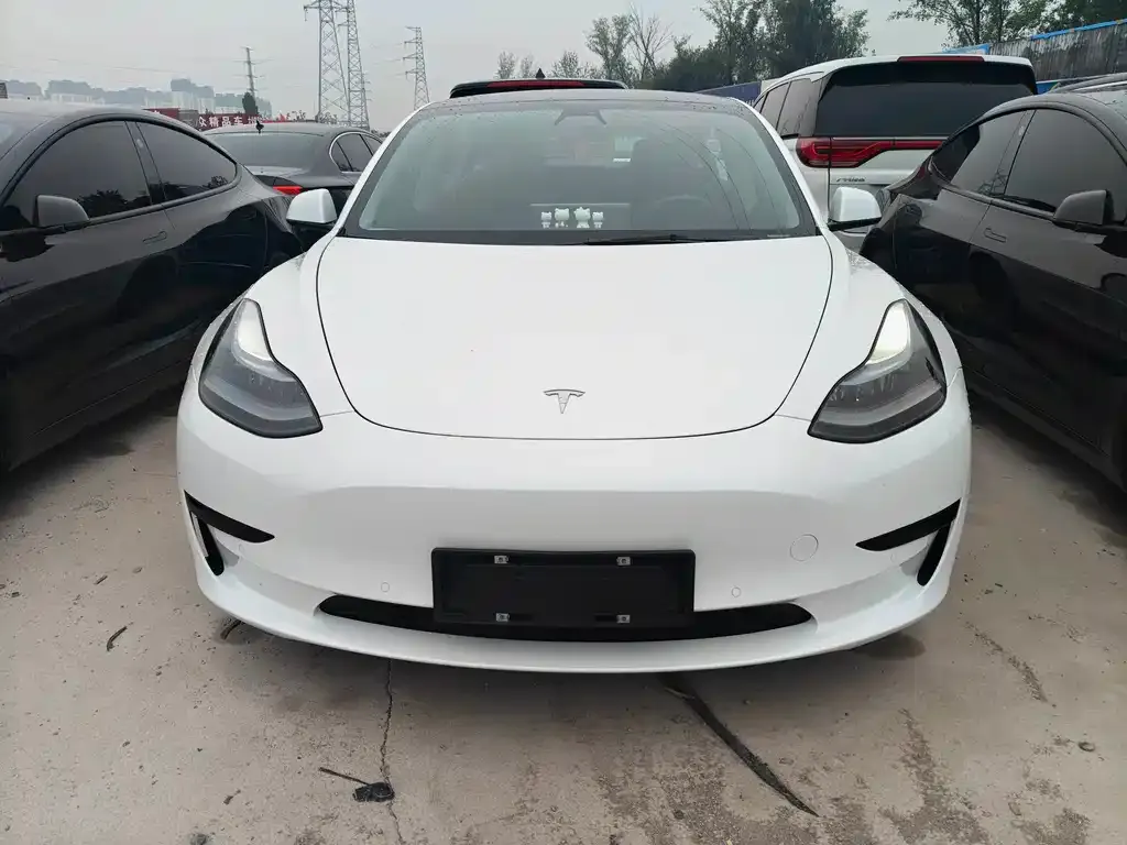 Tesla Model 3 — фото 7