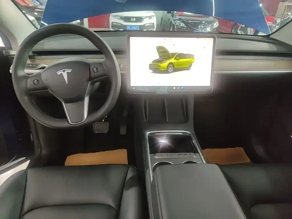 Tesla Model Y — фото 8