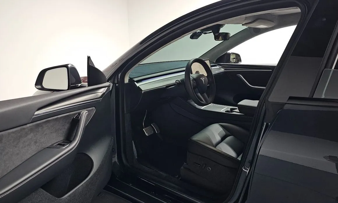 Tesla Model Y — фото 8